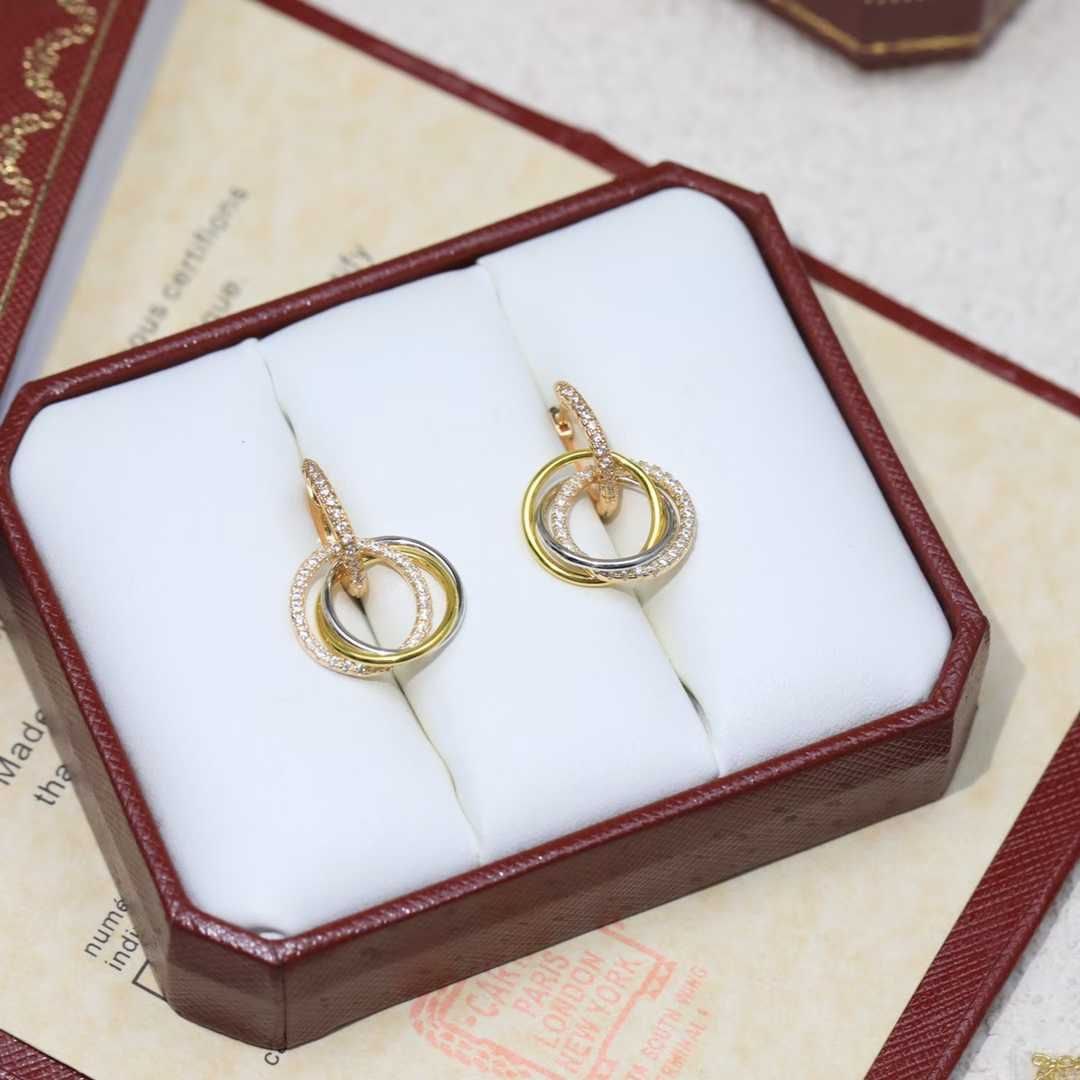 BOUCLES D’OREILLES CARTIER Trinity P