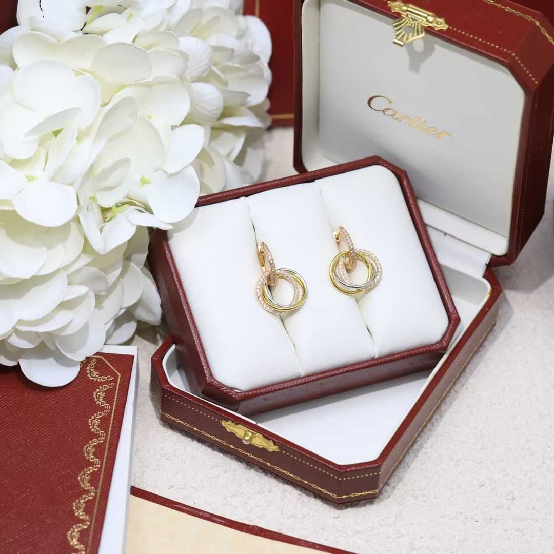 BOUCLES D’OREILLES CARTIER Trinity P
