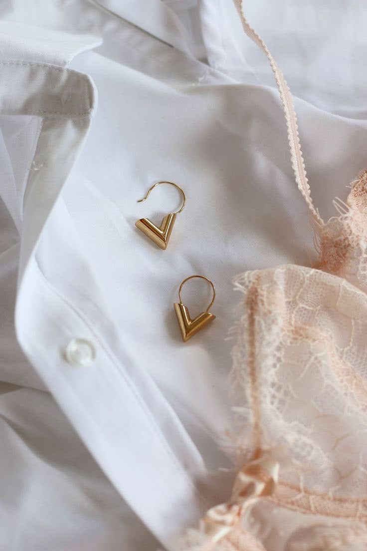 BOUCLE D’OREILLE LV